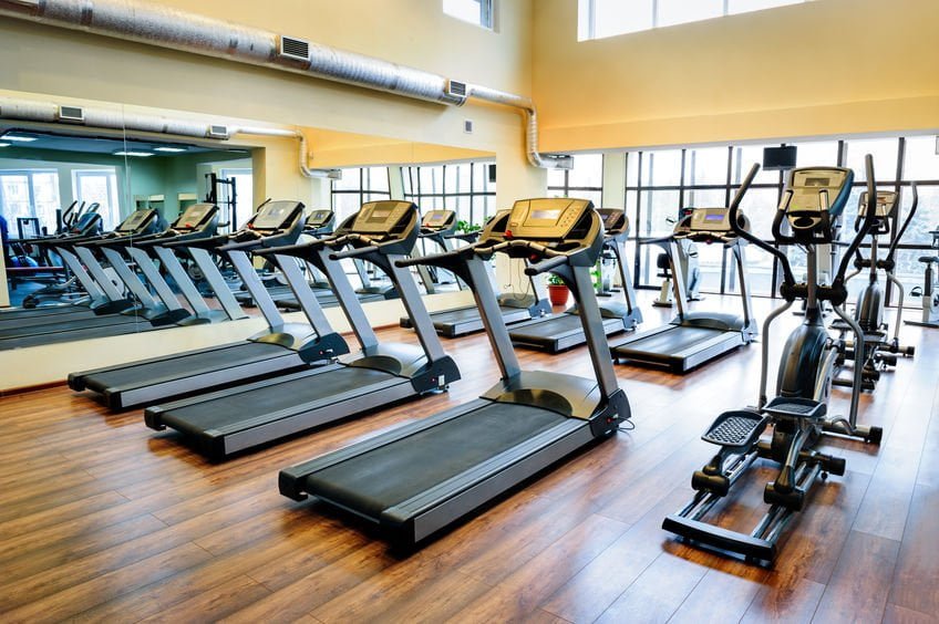 Gym showing treadmills and other exercise equipment.